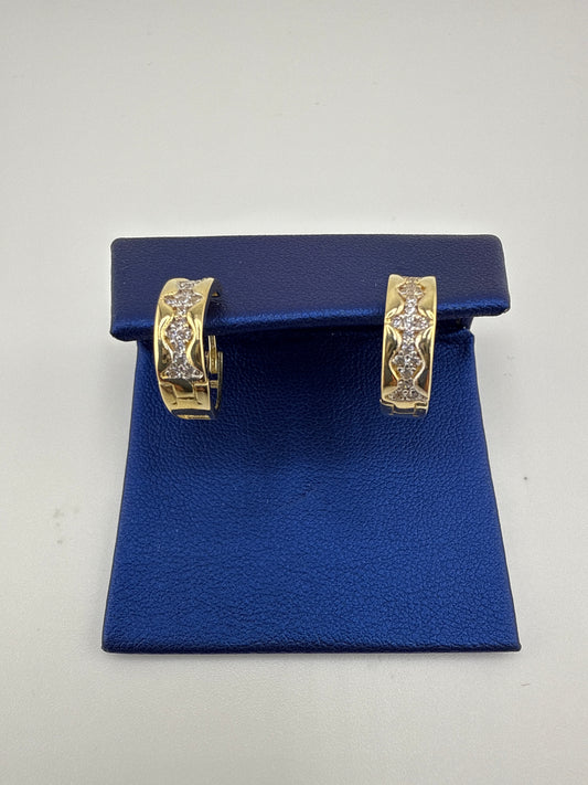 14k yellow gold and zirconia huggie earrings
