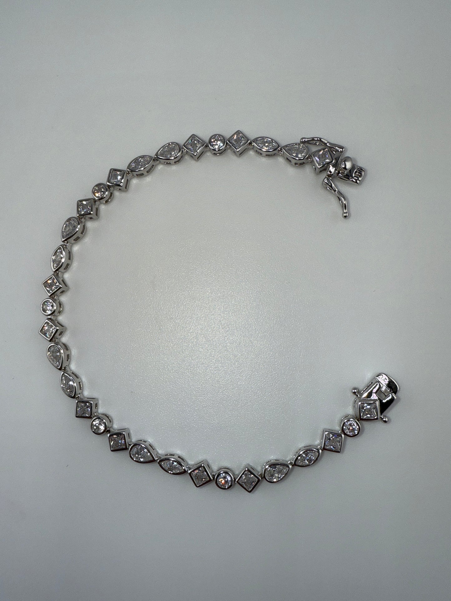Sterling Silver, Multi-shaped Bezel-set Zirconia Bracelet