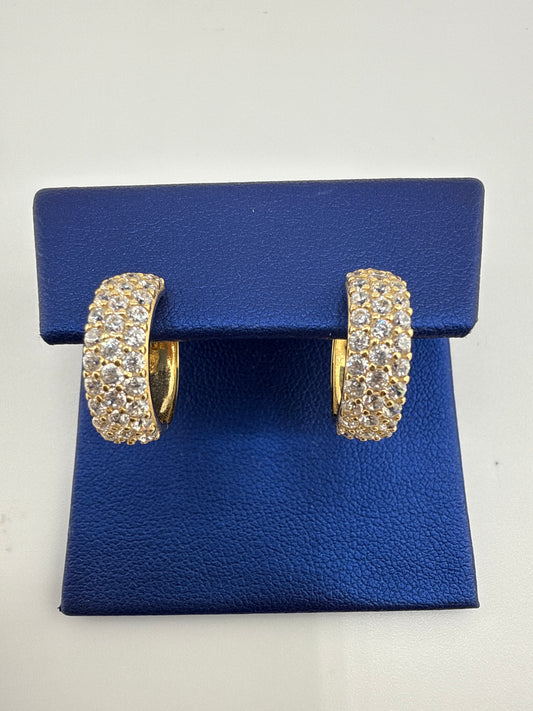 14k yellow gold and zirconia huggie earrings