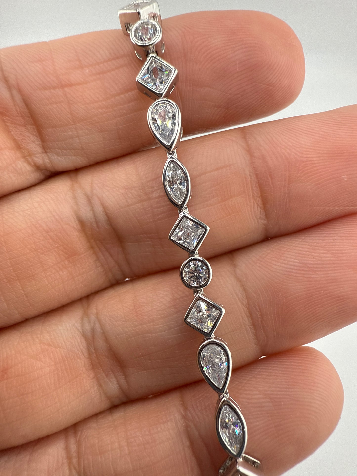 Sterling Silver, Multi-shaped Bezel-set Zirconia Bracelet