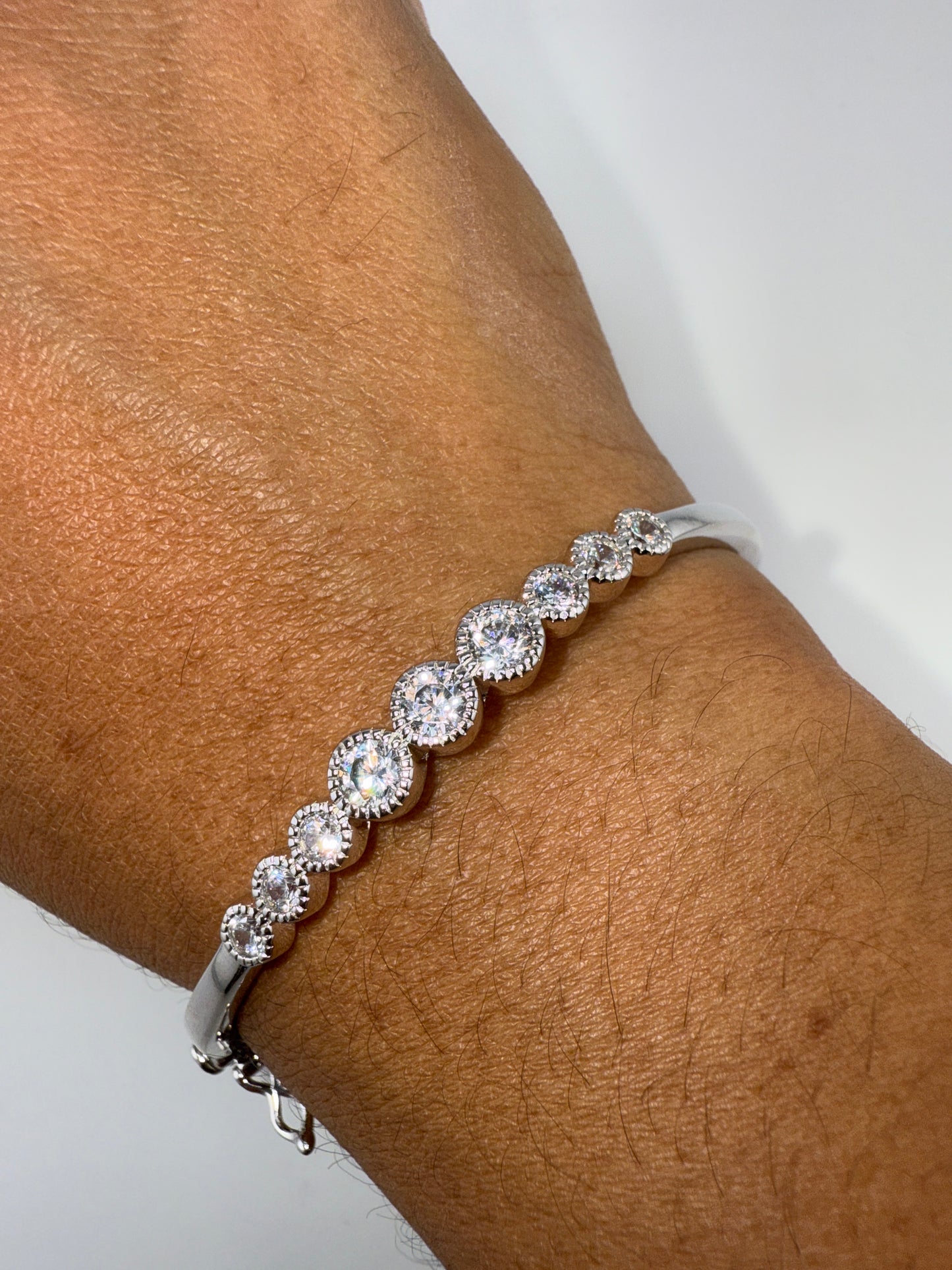 Sterling Silver, Beaded Outline Graduated Round Zirconia Bangle