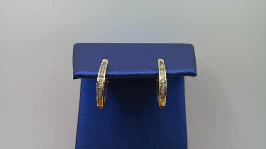 14k yellow gold diamond huggie earrings | .16 carat