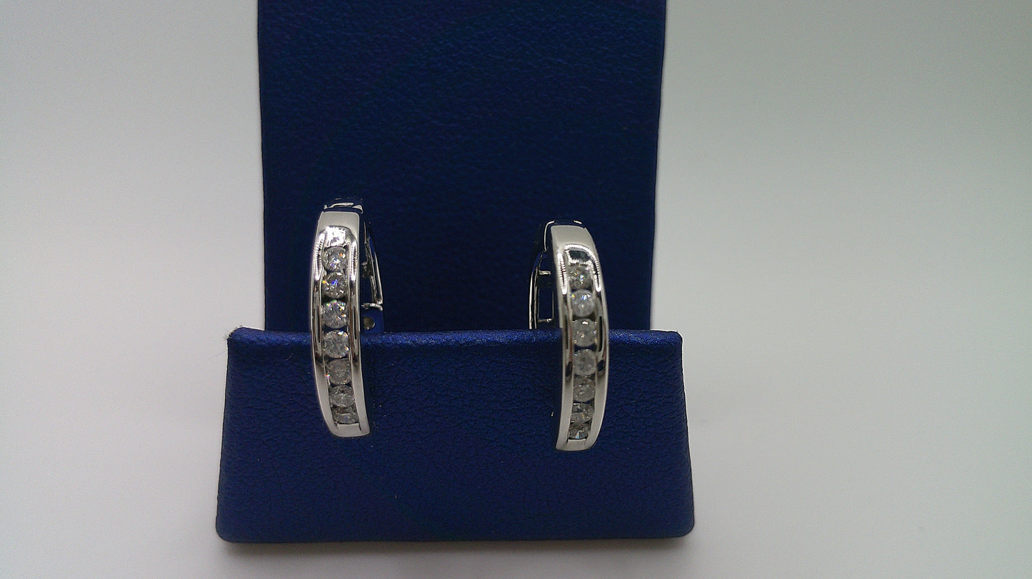 14k white gold diamond huggie earrings | .23 carat