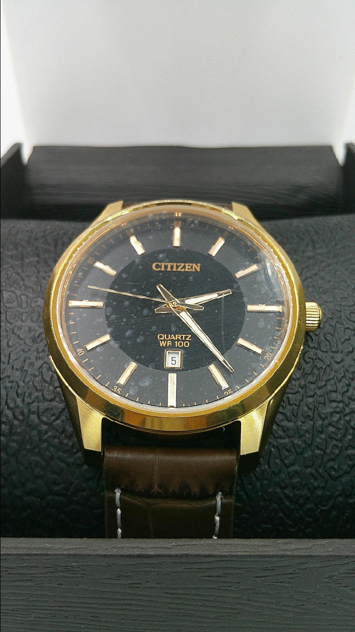 Citizen Watch | Bronze toned stainless steel | black face | Quartz WR 100 | Genuine brown leather