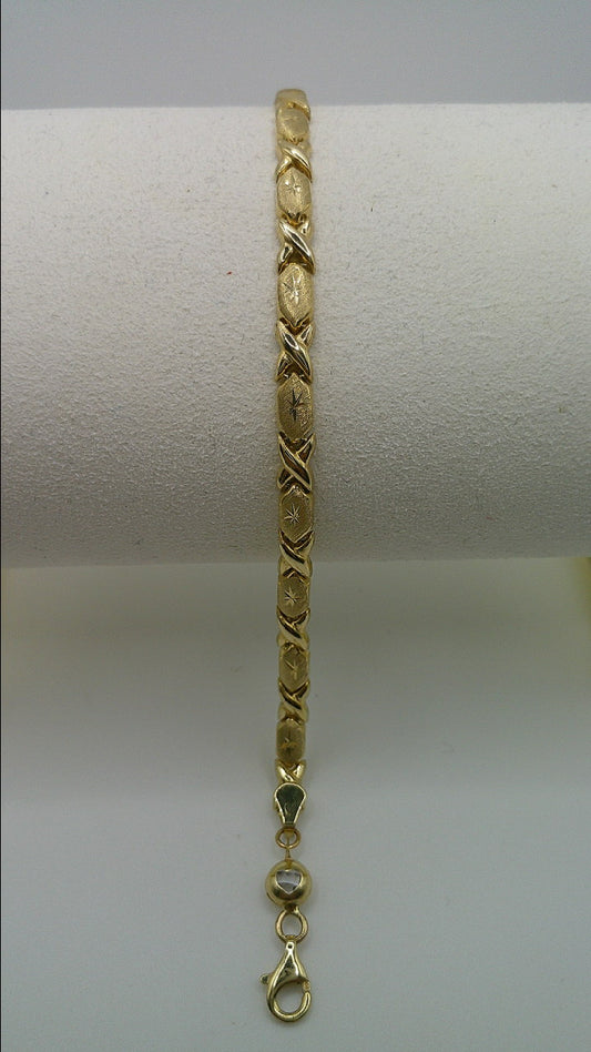 14k yellow gold XO bracelet | star center | 7.25 inches