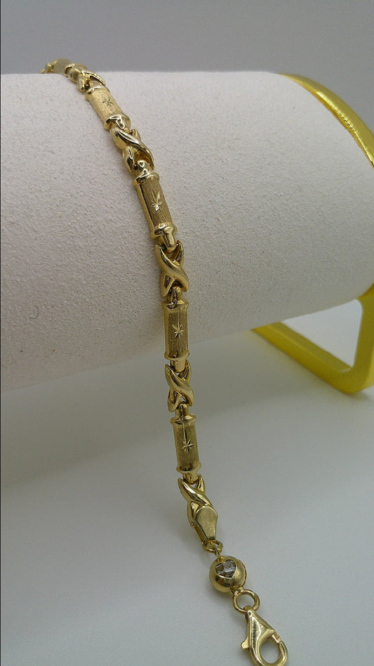 14k gold XO bracelet | star center design | 7.25 inches