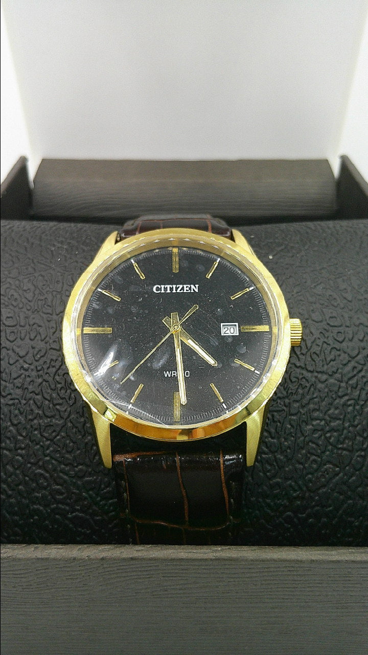 Citizen Watch | Yellow toned stainless steel | black face | WR 50 | genuine brown leather