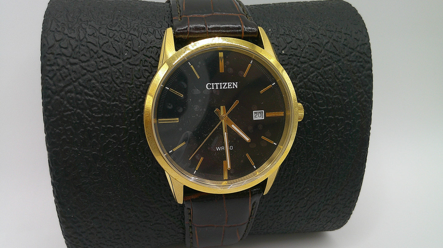 Citizen Watch | Yellow toned stainless steel | black face | WR 50 | genuine brown leather