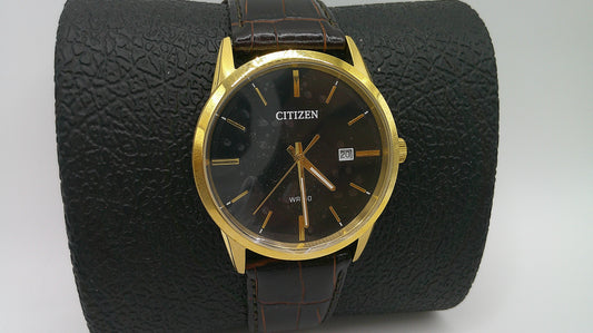 Citizen Watch | Yellow toned stainless steel | black face | WR 50 | genuine brown leather