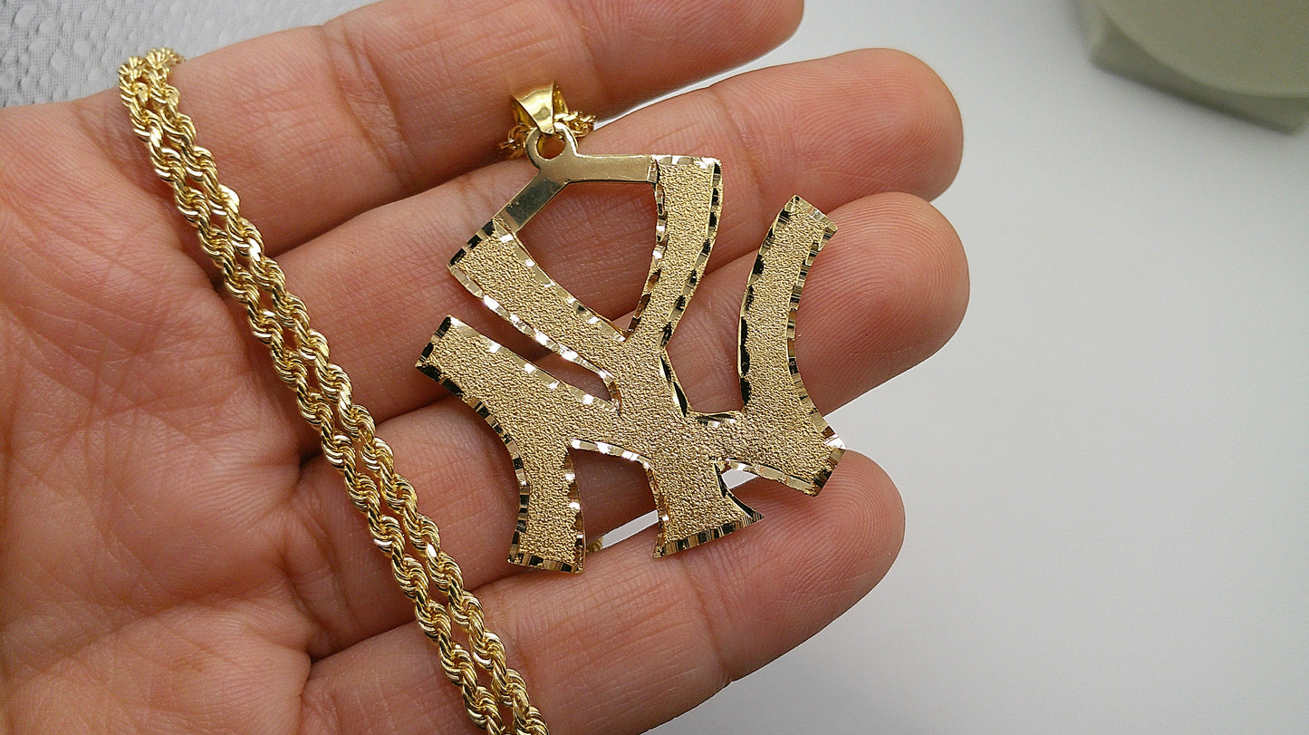 14k gold rope chain with diamond cut New York pendant