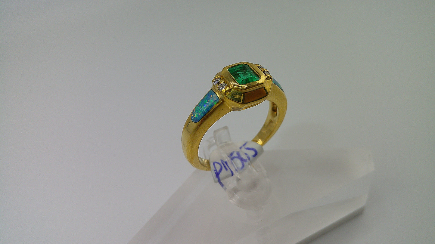 18k gold ring | emerald, opal, and diamonds | .10 ct diamond | size 6.5