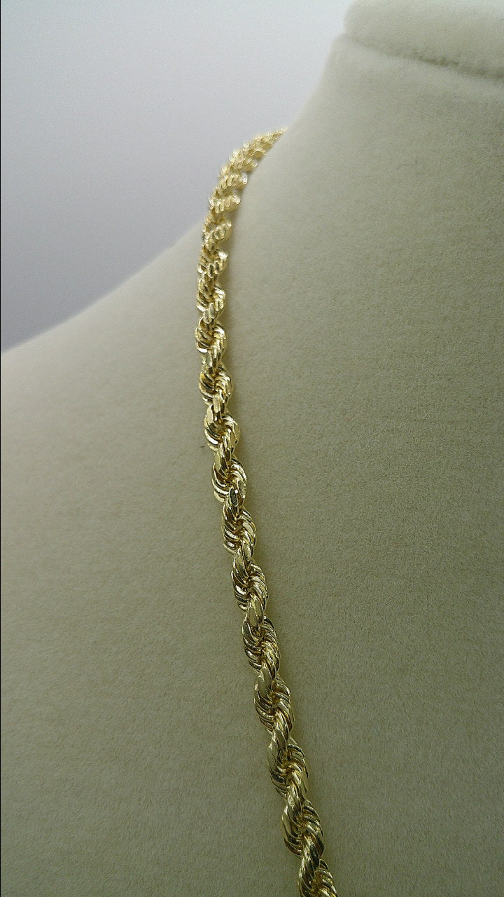 14k gold semi-solid rope chain with two-toned crucifix pendant