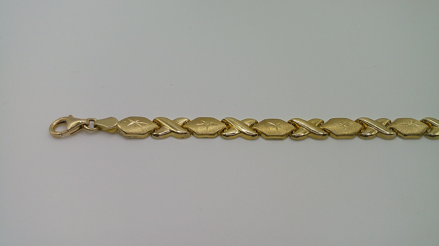 14k yellow gold XO bracelet | star center design | 7 inches