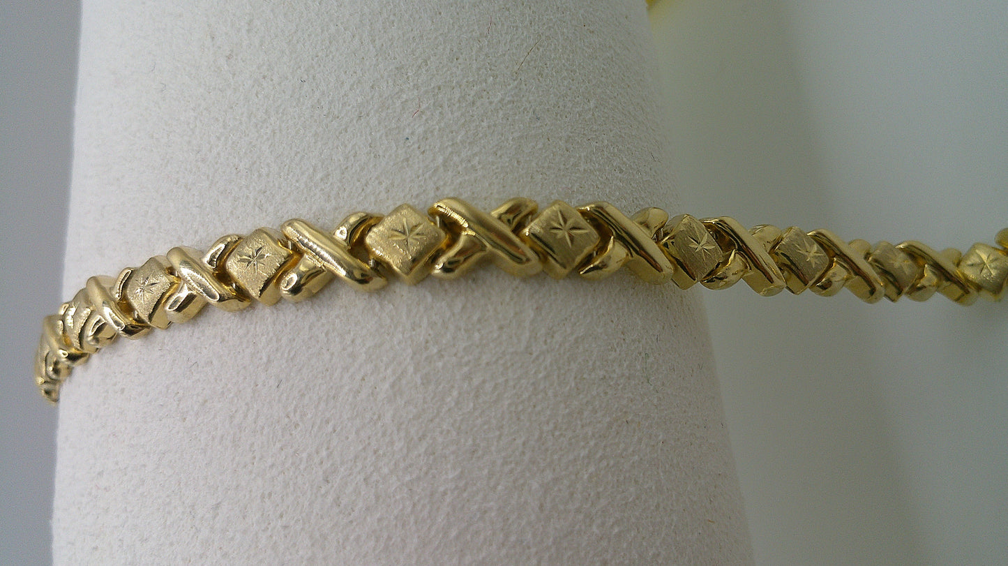 14k gold XO bracelet | 7.25 inches