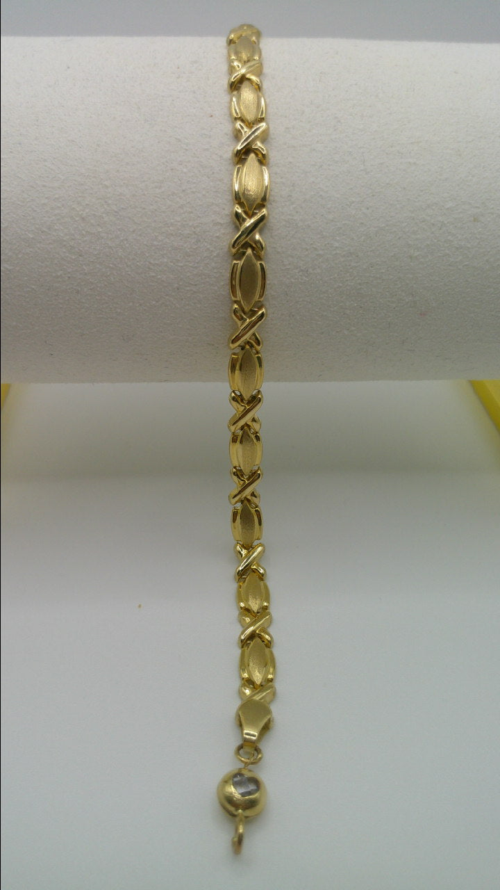 14k yellow gold XO bracelet | 7.25 inches