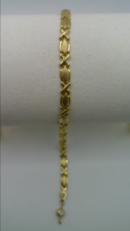 14k yellow gold XO bracelet | 7.25 inches