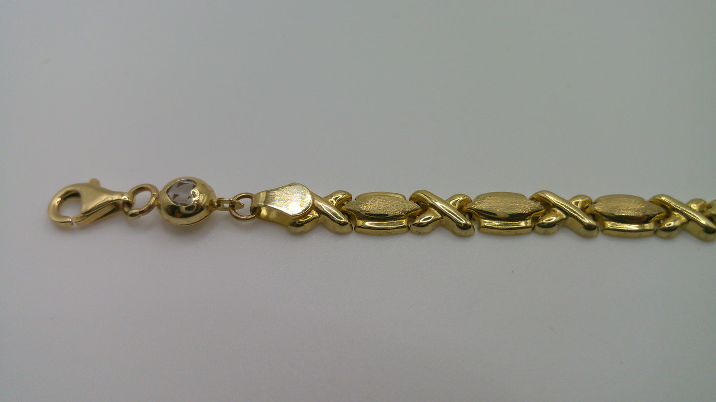 14k yellow gold XO bracelet | 7.25 inches