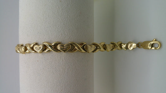 14k yellow gold XO bracelet | star center design | 7.5 inches