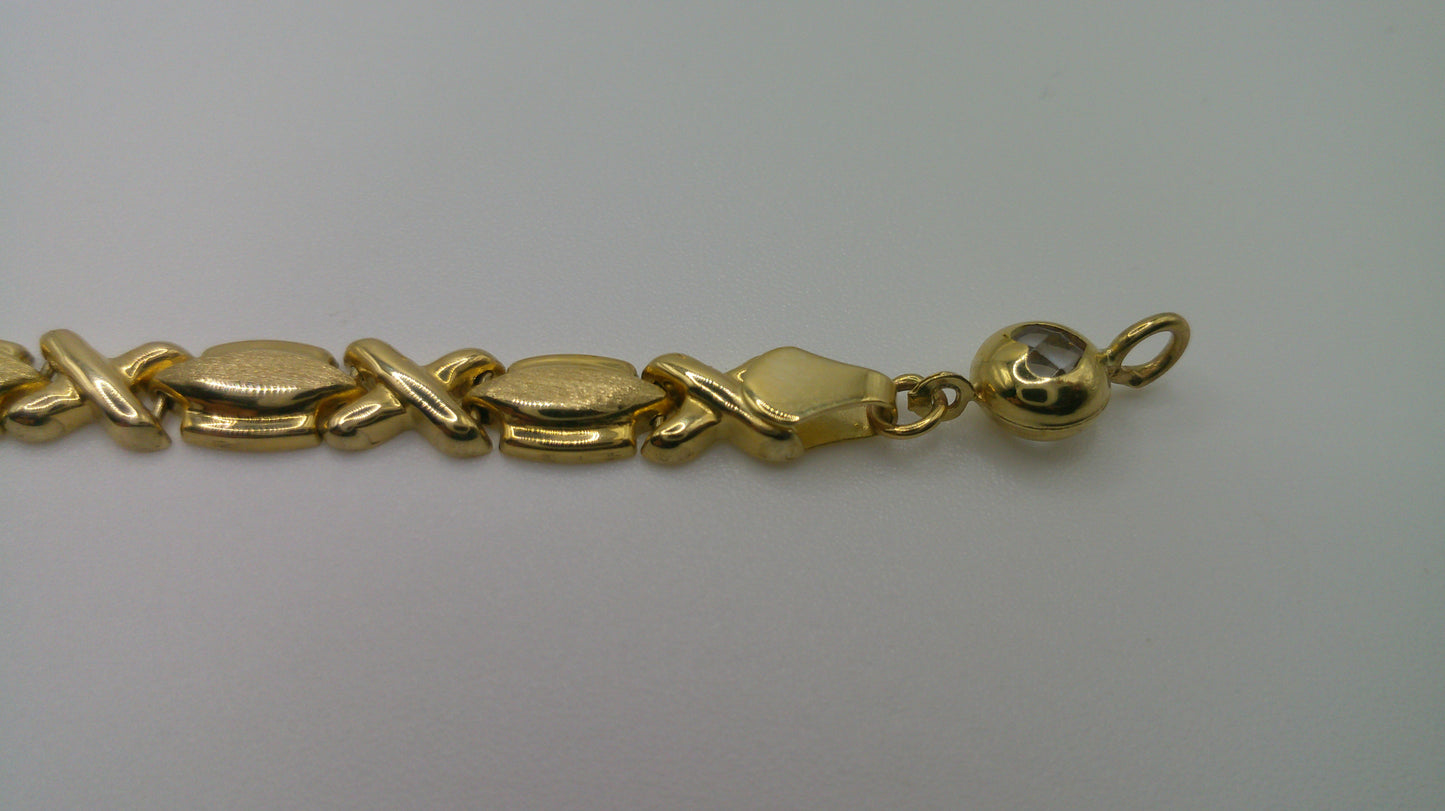 14k yellow gold XO bracelet | 7.25 inches