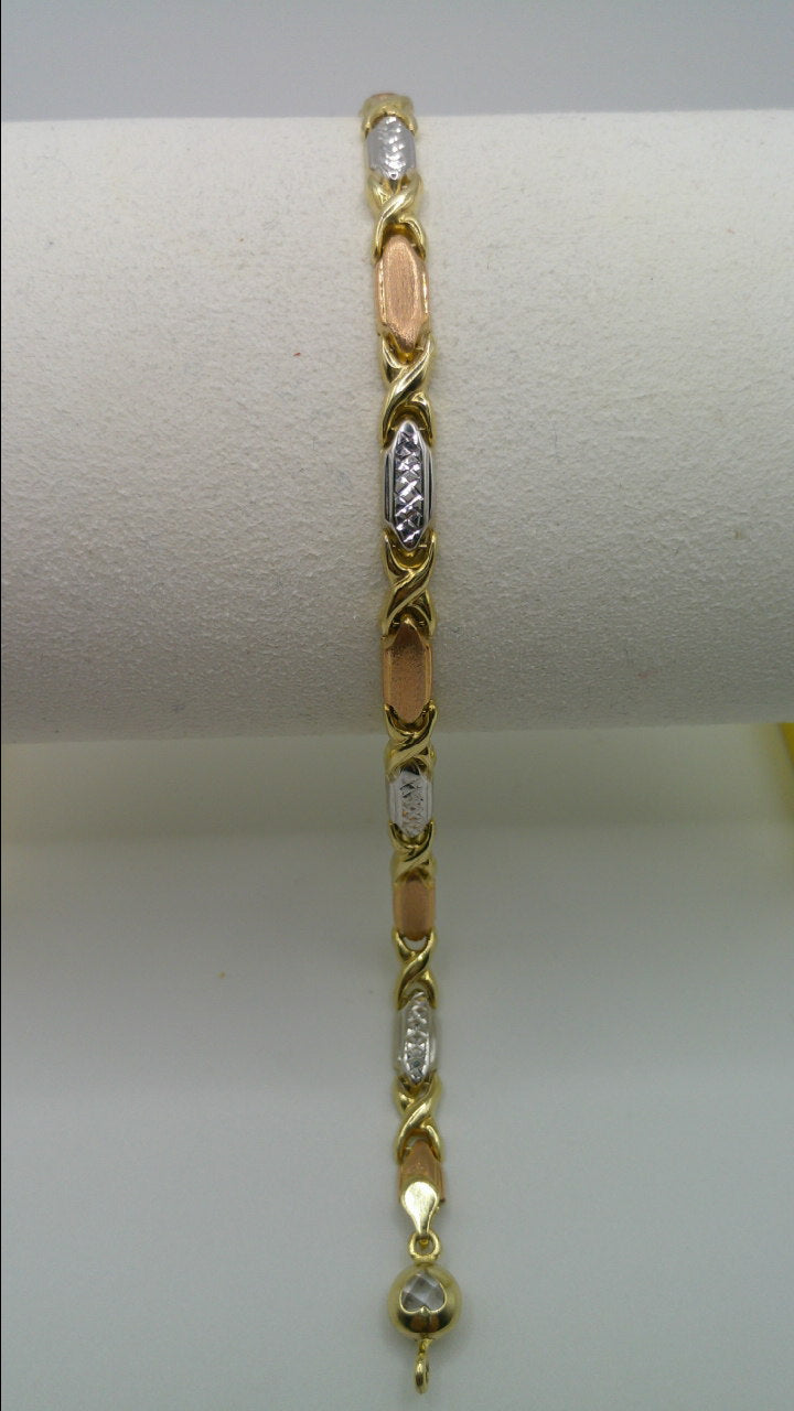 14k tri-color XO bracelet | fancy cut | yellow gold, rose gold, white gold | 7.25 inches