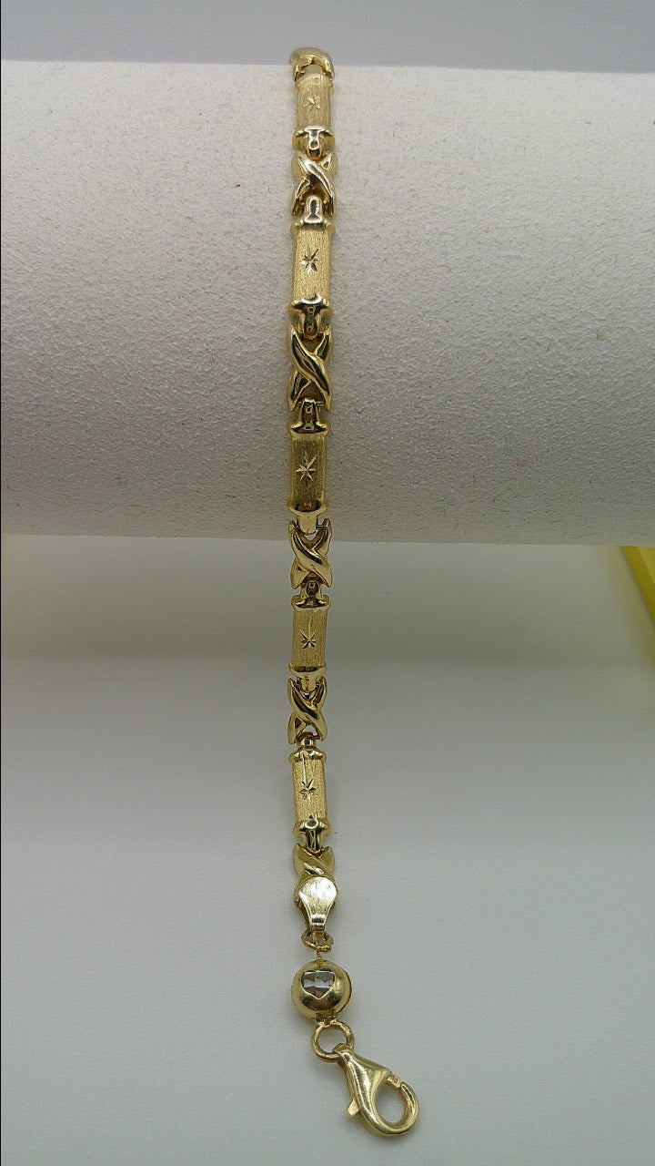 14k yellow gold XO bracelet | fancy cut | star center | 7.25 inches