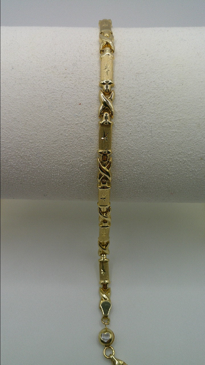 14k yellow gold XO bracelet | fancy cut | star center | 7.25 inches