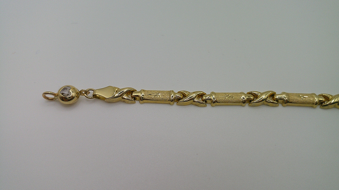 14k yellow gold XO bracelet | fancy cut | star center | 7.25 inches