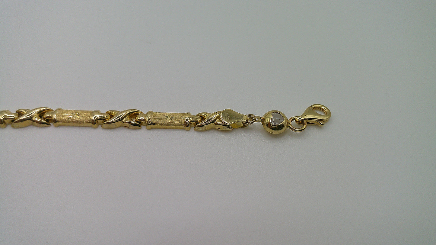 14k yellow gold XO bracelet | fancy cut | star center | 7.25 inches