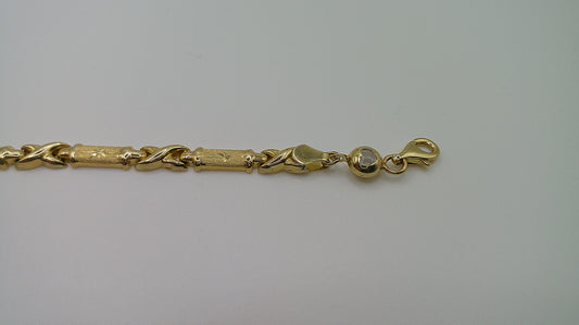 14k yellow gold XO bracelet | fancy cut | star center | 7.25 inches