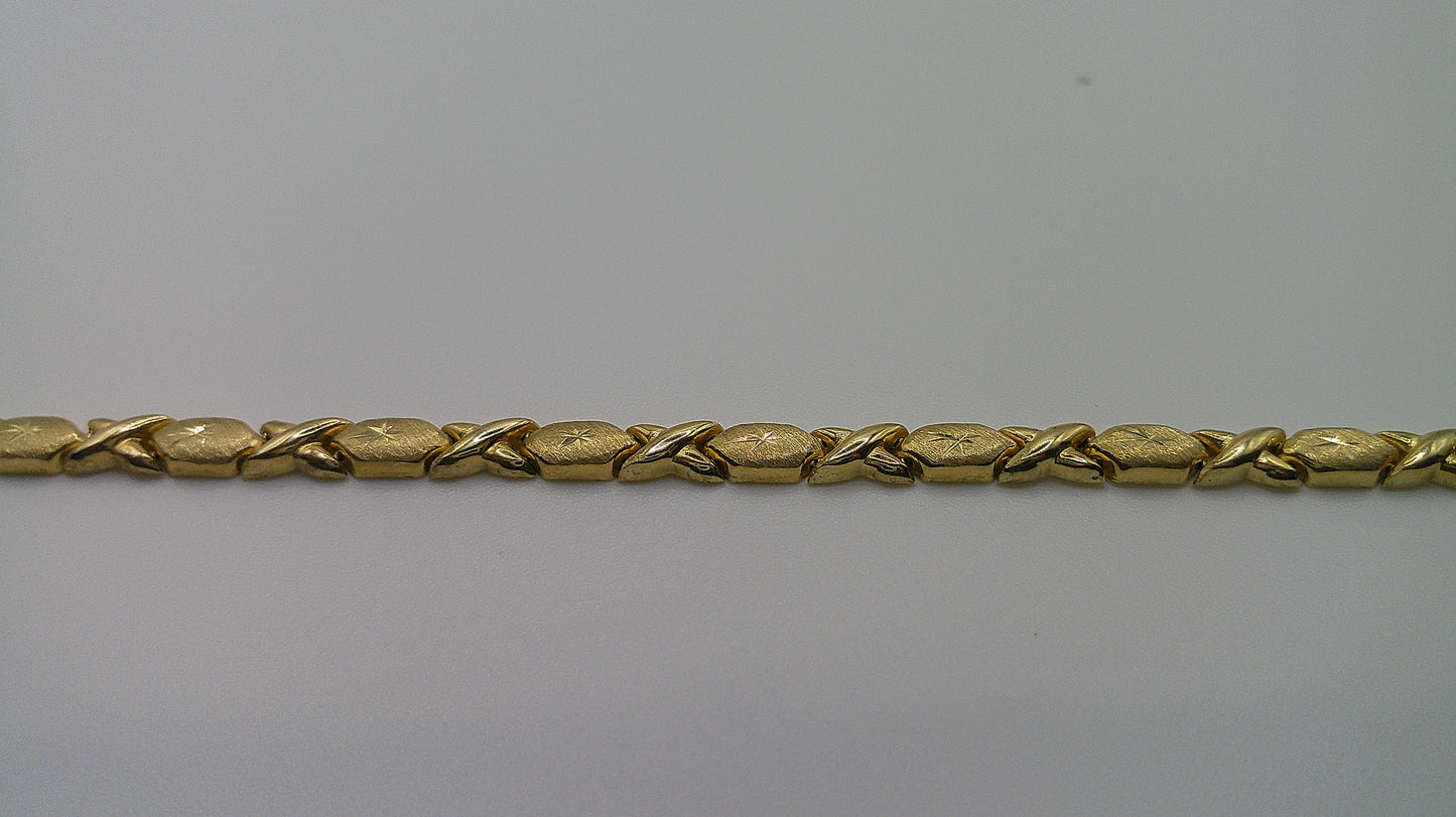 14k gold XO bracelet | 7.25 inches