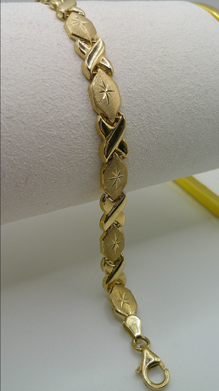 14k gold XO bracelet | star center detail | 7 inches