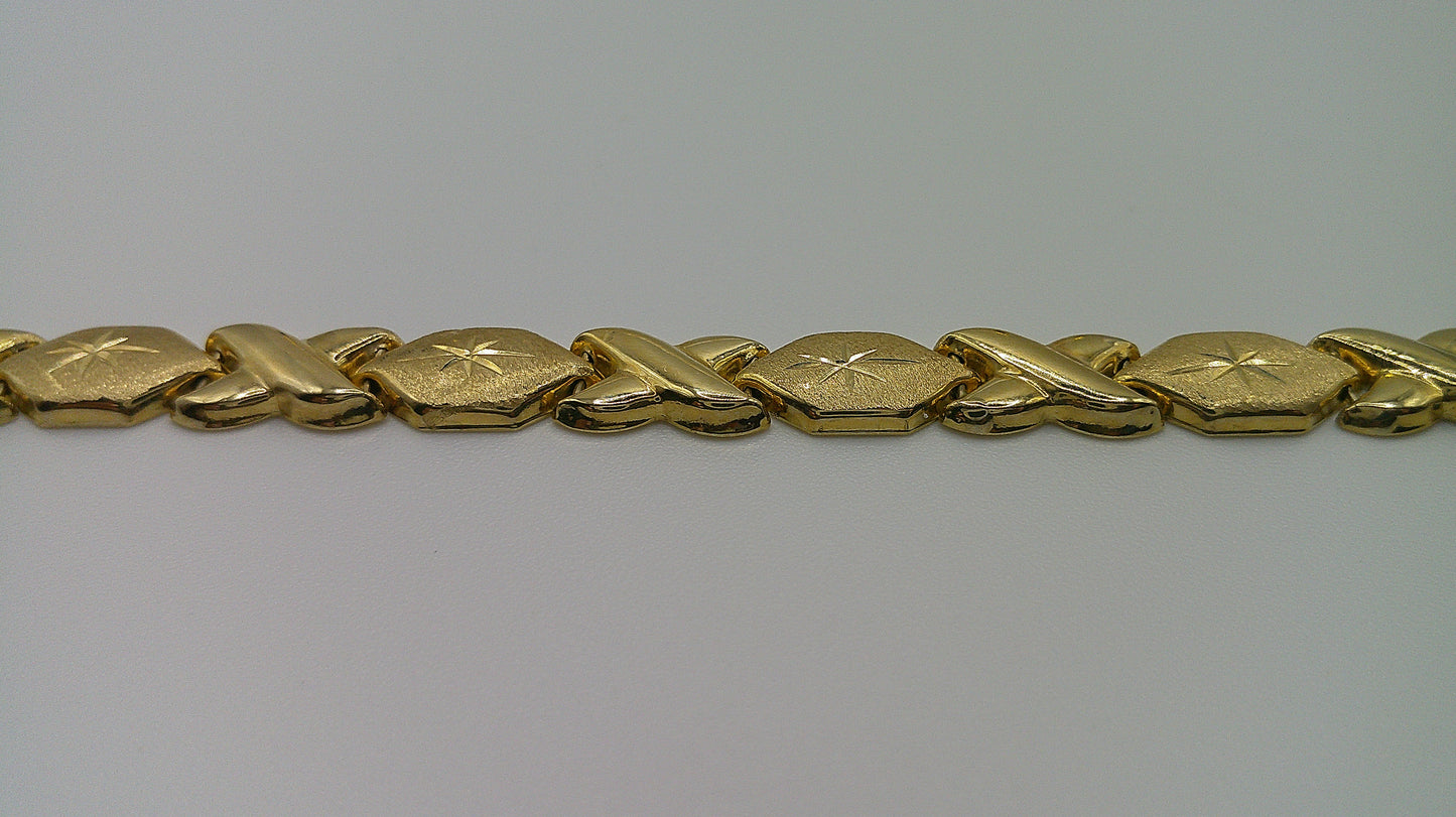 14k gold XO bracelet | star center detail | 7 inches