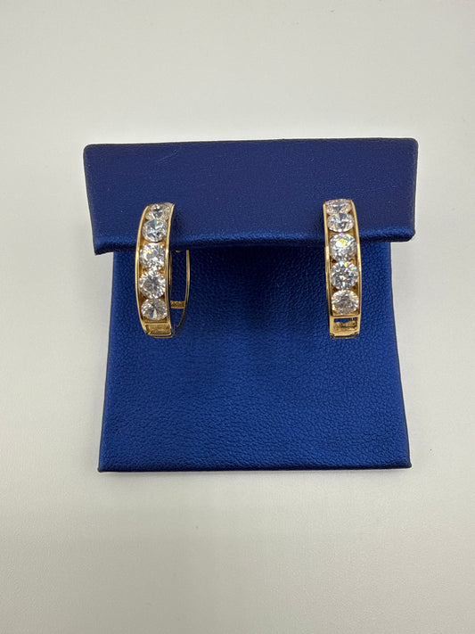 14k yellow gold and zirconia huggie earrings