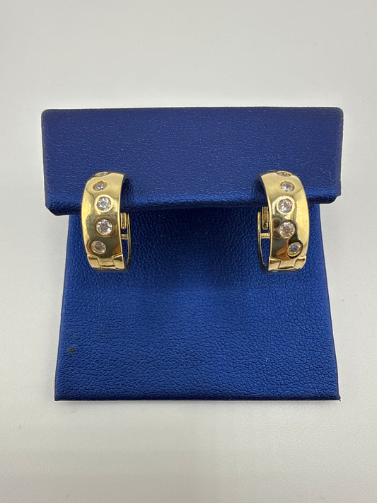 14k gold huggie earrings | zirconia | open backing
