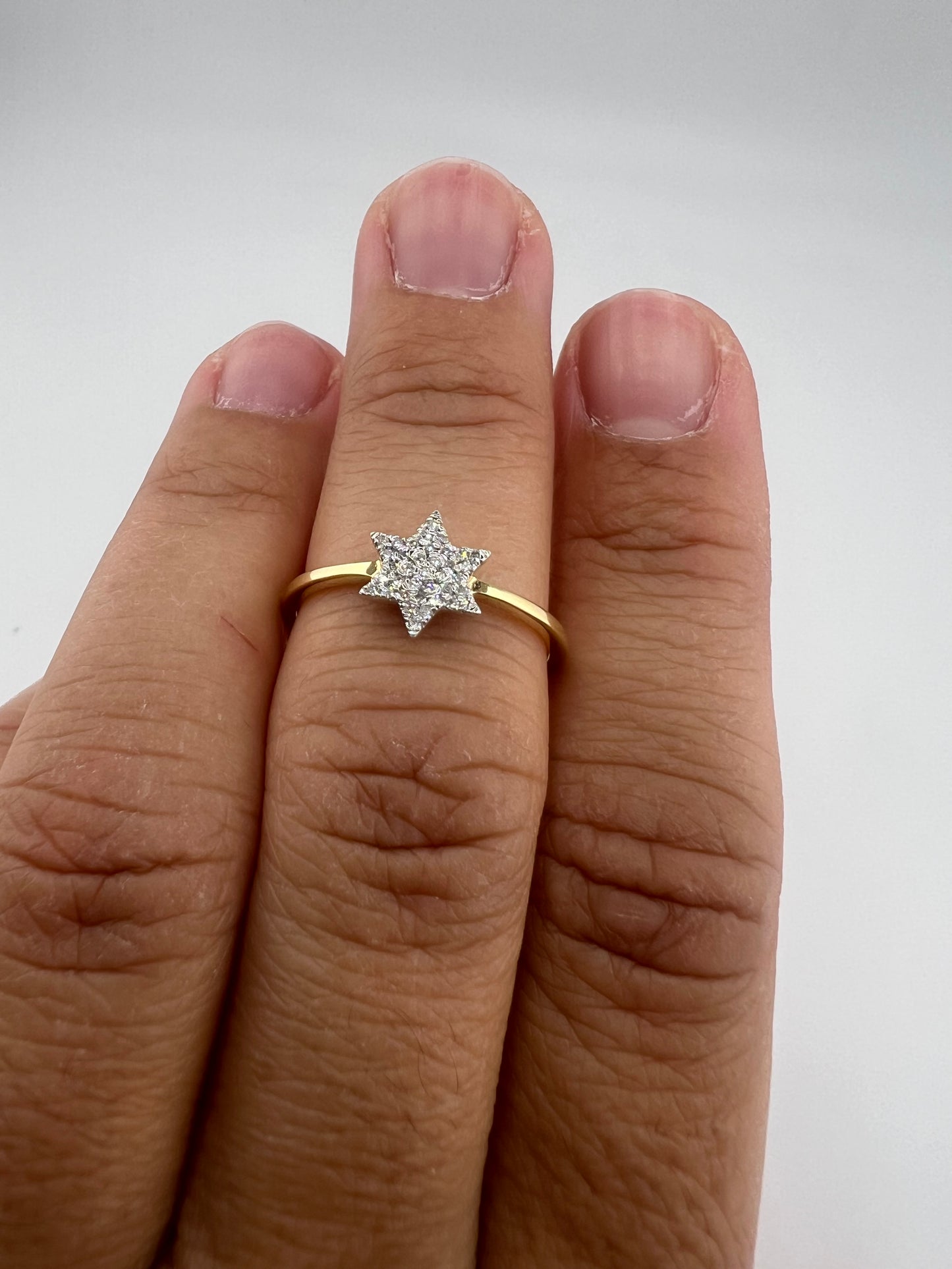 14k yellow gold ring with diamond star